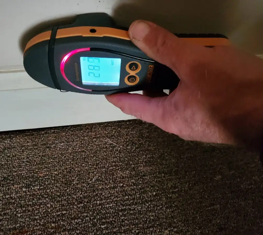 Moisture detection at baseboard during Burst Pipe Cleanup in Chowchilla